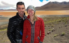 Couple at shore of Laguna Colorada, Bolivia