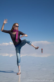 Salar de Uyuni photo, girl kicking tiny boy