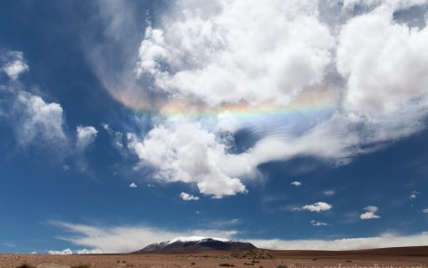 Rainbow in clouds in Eduardo Alvaroa National Reserve, Bolivia
