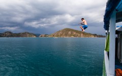 Kenny jumping off the roof of a boat, Angel Island