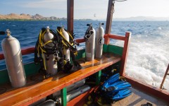 A view from the rear of the boat with dive tanks and other dive equipment