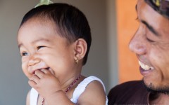 Local Balinese man holding his adorable niece