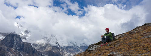 Kenny watching the clouds roll up the valley from an overlook on Nangkar Tsang