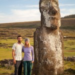Us after sunrise with lone moai at Ahu Tongariki